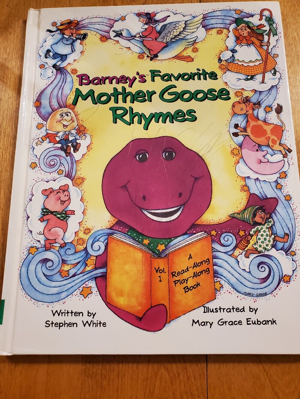 Barneys New York White Book Back Cover with Purple Barney Illustration